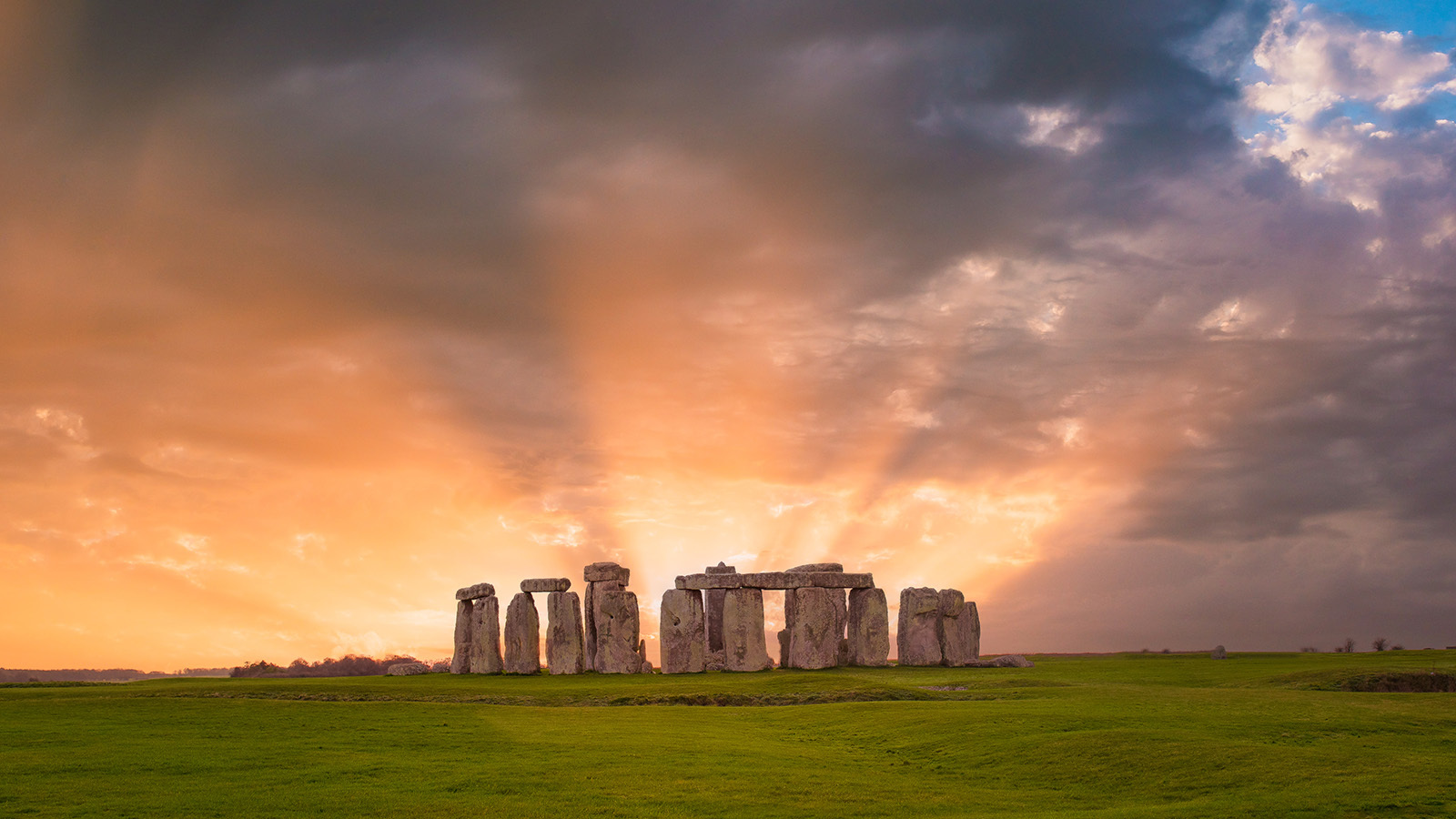 Stonehenge bathed in the light of a setting sun