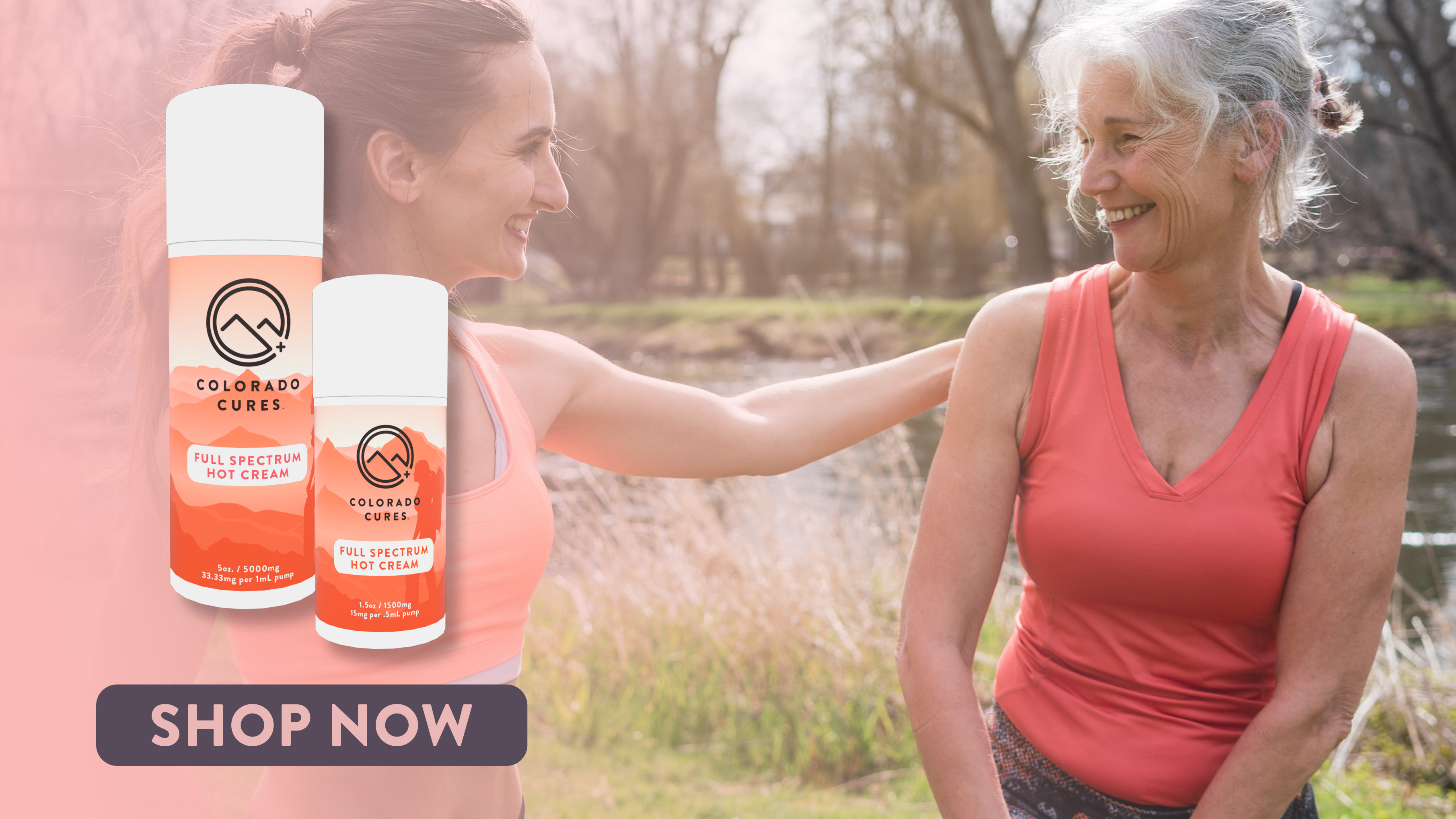 Woman and Adult Child smiling in the park after a workout
